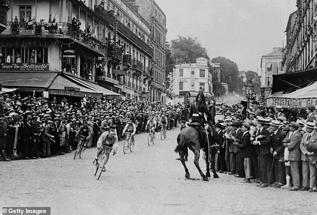 Pictured: Ottavio Bottecchia of Italy chasing Lucien Buysse of Belgium during the final stage of the 1925 Tour de France