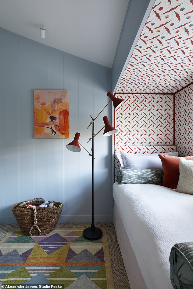 In this bedroom designed by Studio Peake, the floor lamp has several shades to avoid harsh night-time glare. A dimmer switch will achieve a similar effect