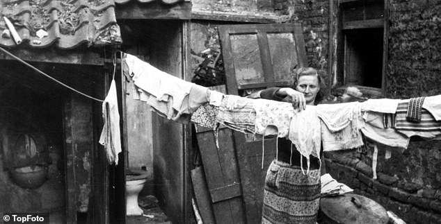 It's horrifying to read about the town planners and architects demolishing 19th-century buildings. Pictured, housing in 1962